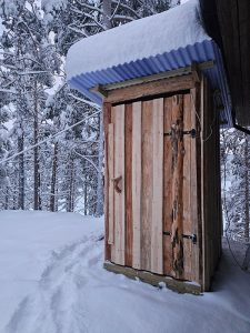 Outside the outhouse