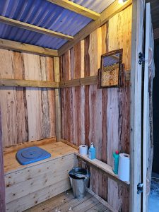 Inside the outhouse